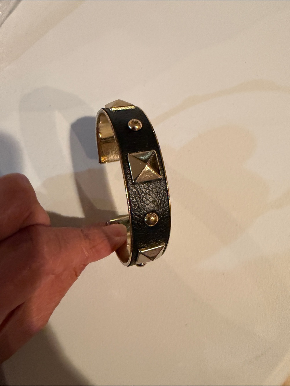 Studded Black Leather Cuff Bracelet with Gold-Tone Accents